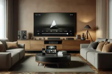 alt_text: A modern living room with a large TV showing the VLC player interface, surrounded by tech gadgets like a laptop and smartphone.